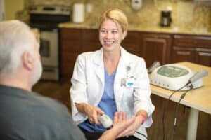 a therapist with a resident at Poway Healthcare