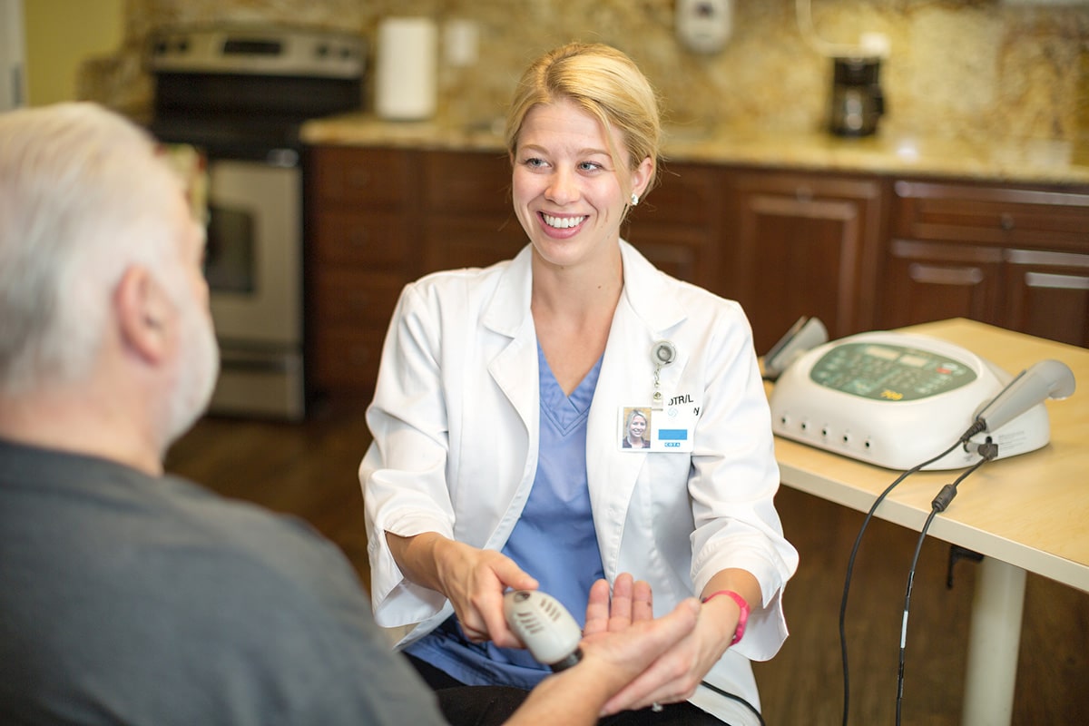 a therapist with a resident at Poway Healthcare